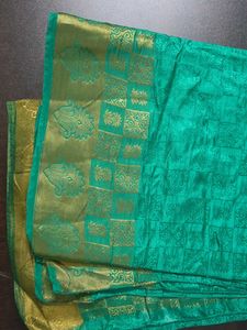 Elegant Teal Saree with Gold Border