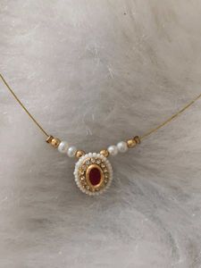 Delicate Gold Necklace with Red Stone