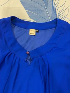 Vibrant Blue Sleeveless Top with Tie Detail