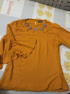 Chic Mustard Yellow Top with Floral Neckline
