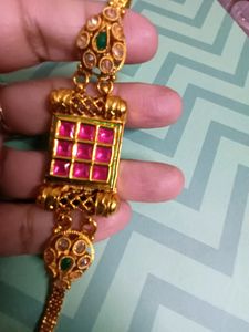 Gold Tone Bajuband with Red and Green Stones