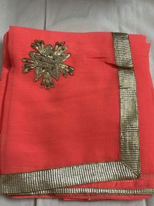 Stunning Coral Saree with Gold Border