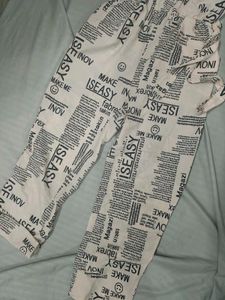 Newspaper Print Sleeveless Jumpsuit