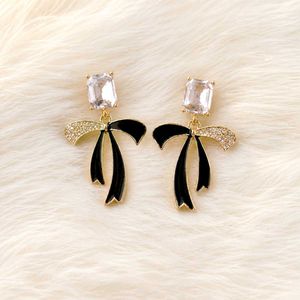 Black Bow Earrings with Crystal Accents
