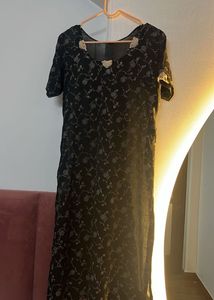 Elegant Black Floral kurta Set.