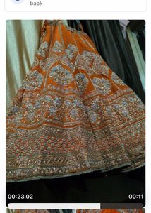 Beautiful Orange Embroidered Lehenga Choli