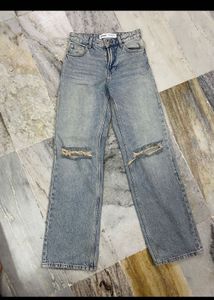 Distressed Light Wash Denim Jeans