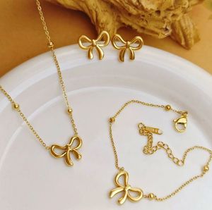 Gold Bow Necklace & Earring Set