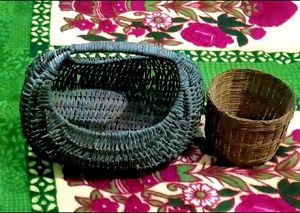 IT IS TWO WOODEN BASKETS......