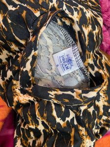 Leopard Print Turtleneck Top