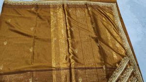 Elegant Brown Striped Saree with Gold Embroidery