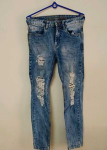Women's Distressed Blue Jeans