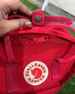 Kanken Fjallraven red backpack