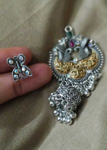 Contemporary Silver Stud Jhumkas ....