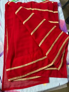 Elegant Red Saree with Gold Border