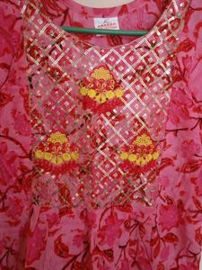 Vibrant Pink Floral Kurta with Embellished Necklin