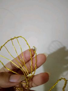 Golden Butterfly Wire arm cuffs.