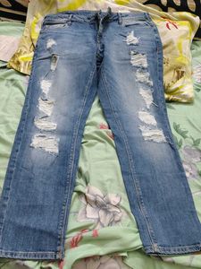 Distressed Blue Denim Jeans