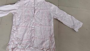 light pink schiffli top with weave and embroidery