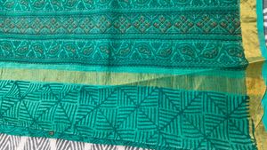 Elegant Teal  kota doria Saree with Gold Border
