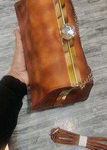 Elegant Brown Clutch with Chain Detail