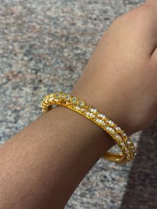 Elegant Gold Tone Bangle Set with Stones