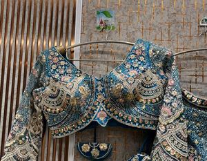 Exquisite Teal Embroidered Lehenga Choli