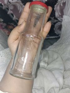 Glass Bottle with Red Lid