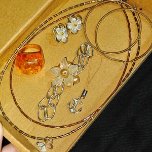 Assorted Gold Jewelry Jar