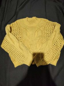 Yellow knitted sweater