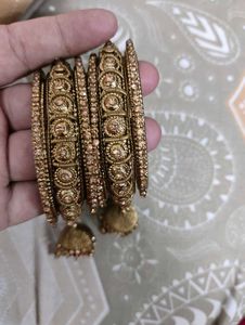 Set of Elegant Gold Bangles with Stones