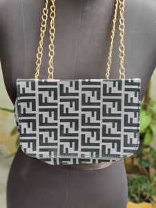 Qaeru FF Print Sling bag In Excellent Condition