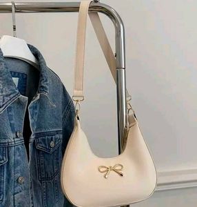 Chic White Shoulder Bag with Bow Accent