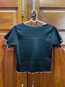 Chic Black Lettuce Hem Top