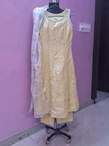 Yellow Striped Kurta Set with Embellished Neckline