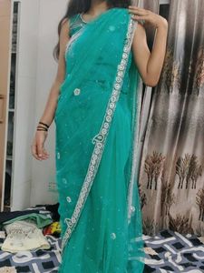 Elegant Teal Saree with Embellishments