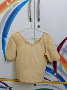 Yellow scoop neck tee