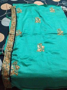 Elegant Teal Saree with Gold Embroidery