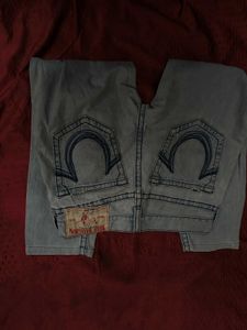 Light Wash Distressed Denim Jeans