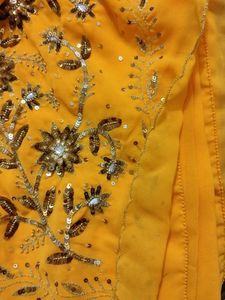 Beautiful Yellow Embellished Saree with blouse