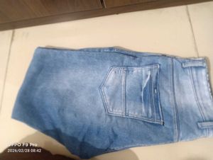 Stylish Light Wash Denim Jeans with Unique Patch D