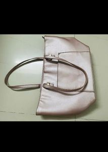 Caprese Women Pink Solid Structured Shoulder Bag