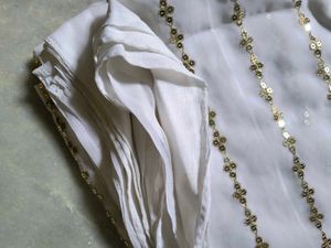 Elegant White Saree with Embroidered Blouse