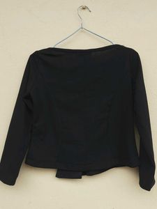 Elegant Black Peplum Top with Embellishments