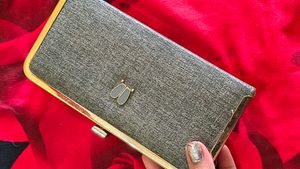 Elegant Grey Clutch with Gold Trim