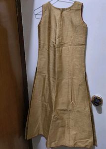 Elegant Gold Kurta with Red Accents
