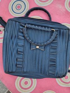 Stylish Blue Handbag with Bow Accent