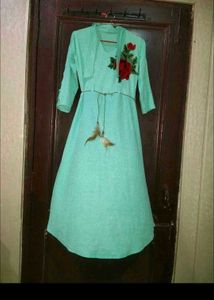 Beautiful Mint Green Gown with Floral Embroidery