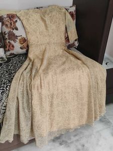 Elegant Beige Embroidered Gown
