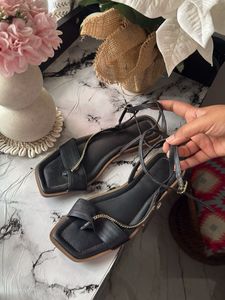 Chic Black Flat Sandals with Gold Chain Detail